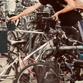 Man locking up a bike